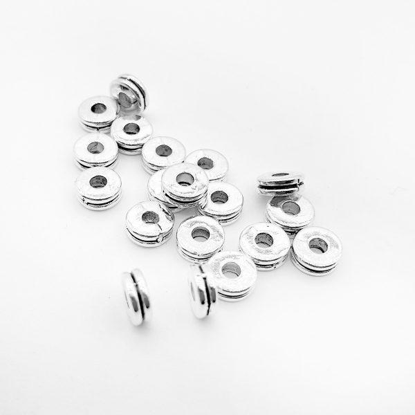 Kovový ozdobný dělící korállek